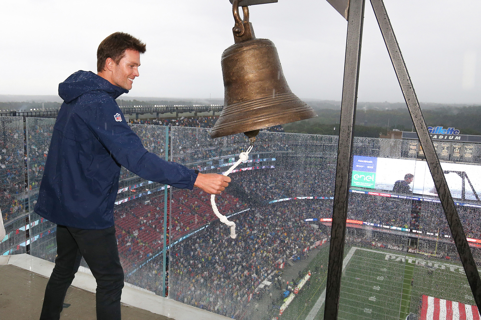 Tom Brady ringing the bell as the inaugural keeper of the light on September 9, 2023.
