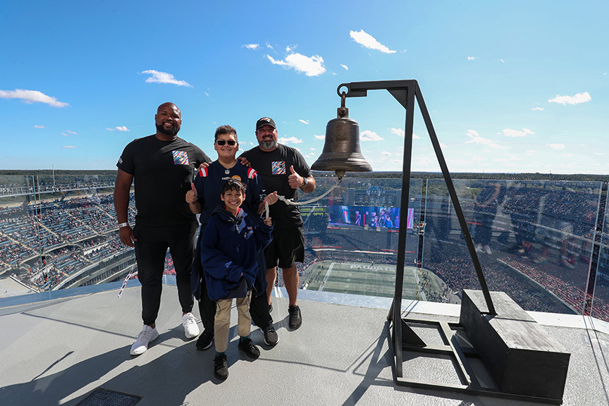 Jake Drake and co. smiling at the camera while ringing the bell, as keeper of the light on October 10.