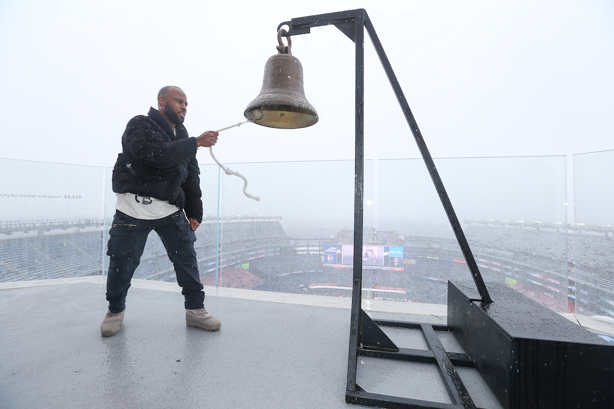 James White ringing the bell on a snowy day.