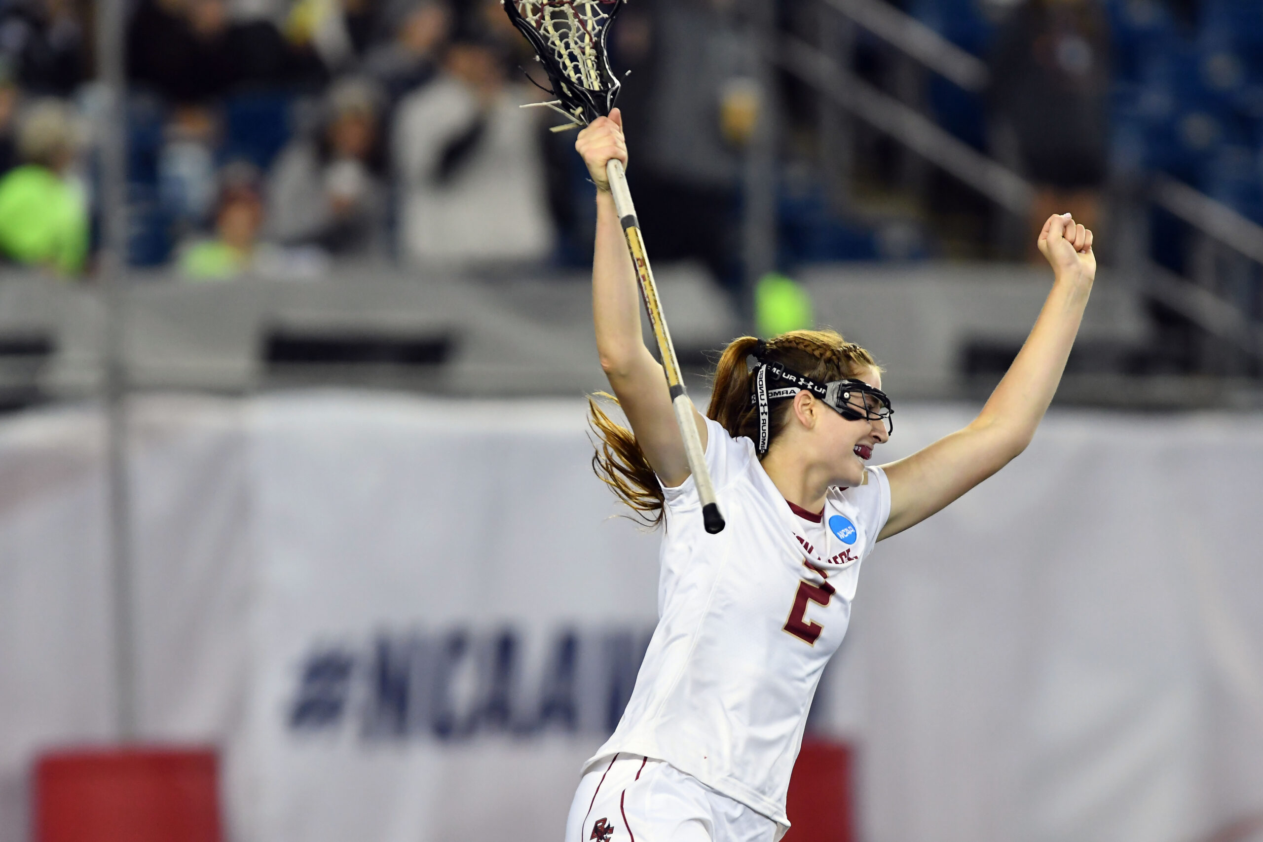 Lacrosse player cheering.