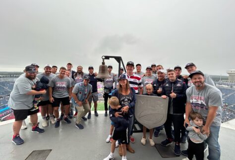 2024 Major League Rugby Champions the New England Free Jacks ringing the bell.