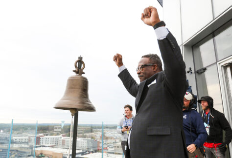 Andre Tippett with his arms up in the air as keeper of the light on October 13.