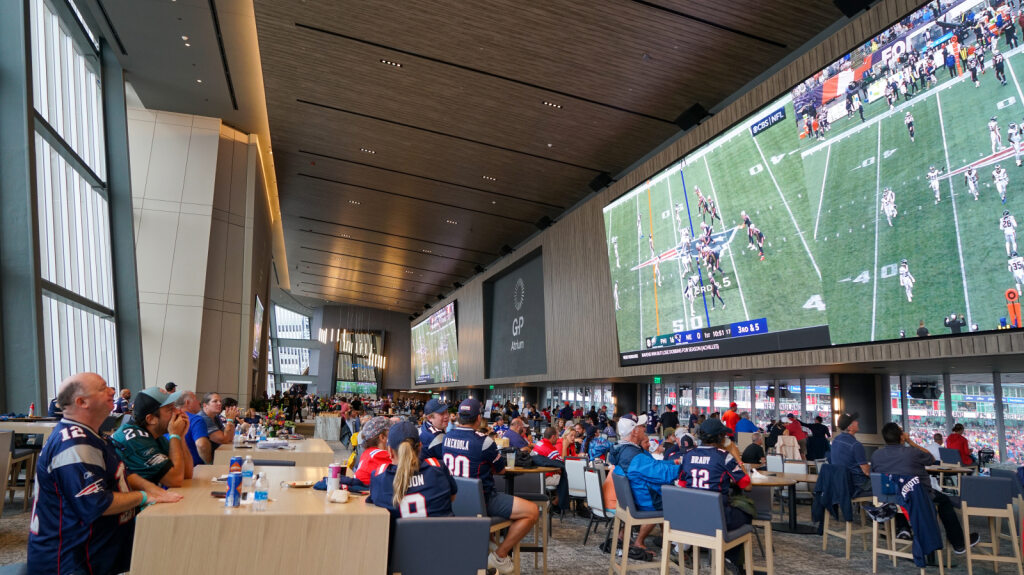 Fans in G-P Atrium on a game day.